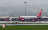 Jet2 passenger jets parked up on the runway at Leeds Bradford Airport.