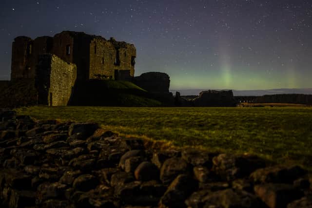 The Aurora Borealis is seen above the ruins of Duffus Castle in Scotland in February 2021.