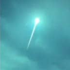 Blue fireball shoots across night sky in Europe.