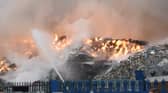 Fire rages at a Huyton industrial estate as 10 fire engines tackle blaze.