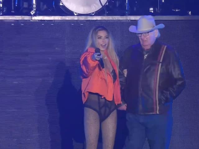 Shania Twain invites 81 year old superfan, Ken, on stage during her set at Lytham Festival.