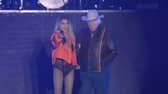 Shania Twain invites 81 year old superfan, Ken, on stage during her set at Lytham Festival.