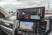 The Carpuride W103 sits on top of your dashboard, or on the windscreen, and gives you full access to Android Auto or Apple CarPlay
