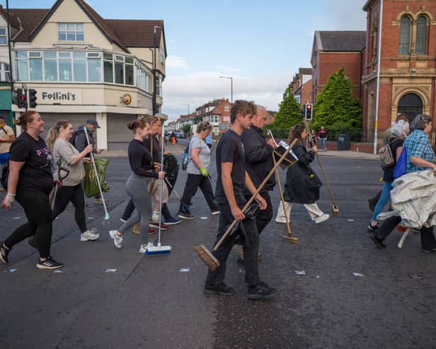Members of the Middlesbrough community come together to clean up their streets after far-right activists destroyed property following riots on 5 August (Photo: Ian Forsyth/Getty Images)