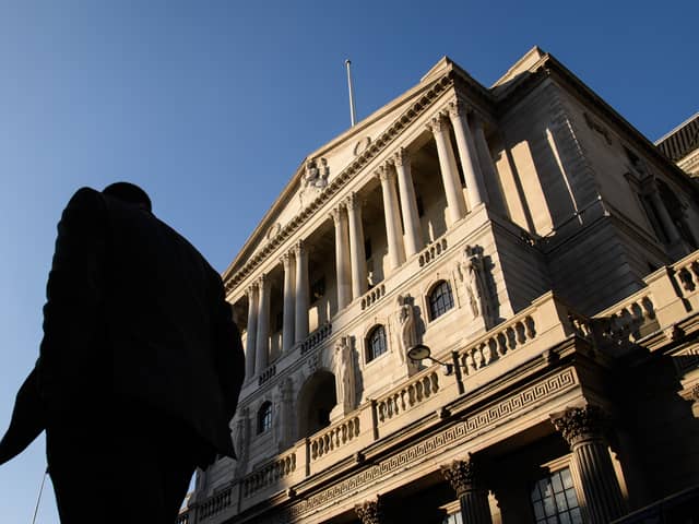 City workers walk past the Bank of England in London (Photo: Leon Neal/Getty Images)