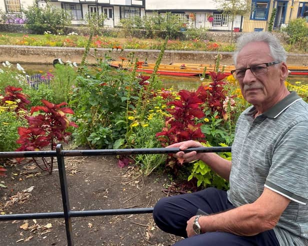 Former councillor Terry Westgate says tourists eager to get the perfect snap have trashed public flowerbeds in an "absolute tragedy' for the city.