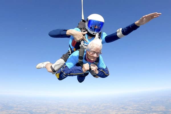 Manette Baillie, from Benhall in Suffolk, does a tandem skydive at the age of 102.