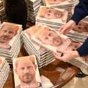 Prince Harry Spare: When does it come out in paperback and are there any new additions? A bookseller holds a copy of "Spare" by Britain's Prince Harry, Duke of Sussex, at Waterstones' flagship Piccadilly bookshop on the day of its release in London, on January 10, 2023
