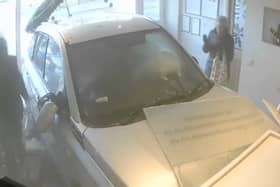 The moment former police officer William McBurnie crashes into a funeral home in an attempt to murder his ex-partner