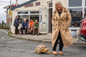 Jackie Leek takes her giant pet tortoise called Mr Miyagi on regular walks to the pub.