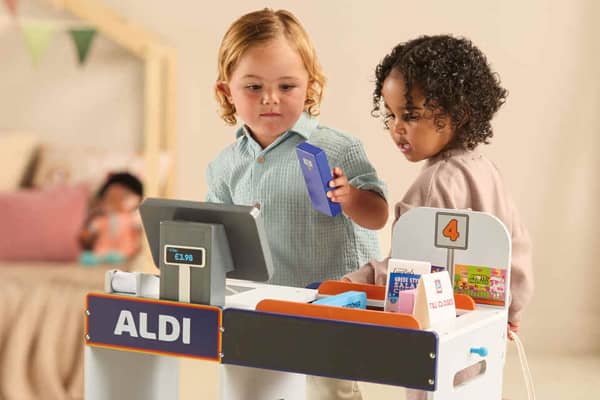 Aldi is launching its new wooden toy Specialbuys event featuring a checkout till, pictured