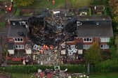 Three adults and one child have been rushed to hospital after a large fire destroyed a house in Newcastle. 
