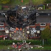 Three adults and one child have been rushed to hospital after a large fire destroyed a house in Newcastle. 
