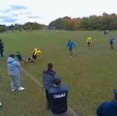 Reggie, 12, accidentally being slide tackled by non-league footballer Terry.