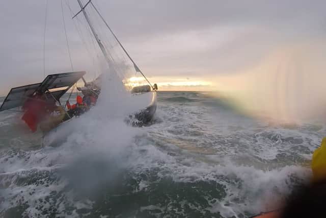 Waves crashing on the casualty vessel off the coast of Walmer near Deal in Kent.