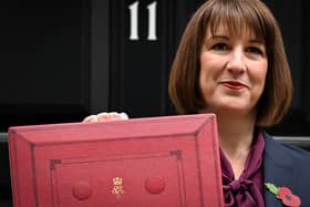 Rachel Reeves poses with the red Budget Box as she leaves 11 Downing Street to present the government's annual Autumn budget to Parliament (Photo: JUSTIN TALLIS/AFP via Getty Images)