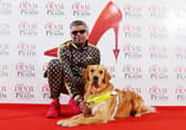 Bill with his Guide Dog handler Mohammed Ibrahim on the red carpet of The Devil Wears Prada at Dominion Theatre