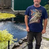 Nigel Cooper and his Koi pond in Ulverston, Cumbria. 