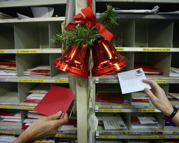 Royal Mail postal workers sort Christmas cards in the Royal Mail Regional Sorting Office in Filton (Photo: Matt Cardy/Getty Images)
