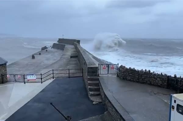 Huge waves crash into Porthcawl pier.
