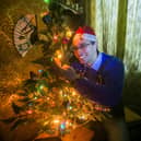 Ross Shaddick from Plymouth, Devon, with his Christmas lights which have finally gone out after 54 years.