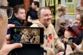Chris McCausland poses for selfies outside Blackpool Tower during Strictly Come Dancing visit.