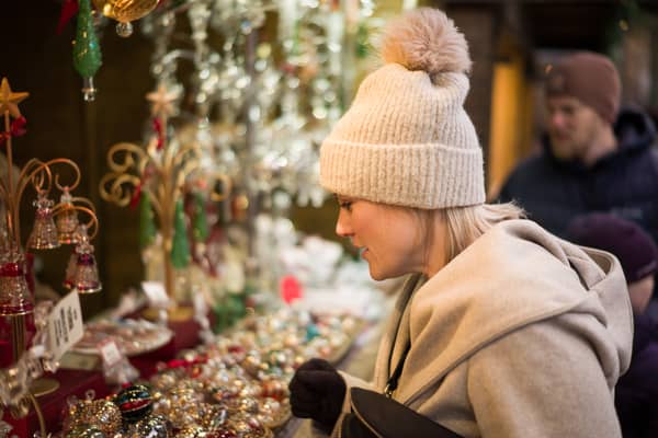 Shoppers at a Christmas market. 