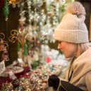 Shoppers at a Christmas market. 