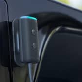 The Echo Auto sits discreetly on your dashboard, ready to take commands