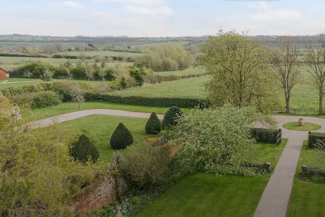The formal gardens of the Wiltshire house are beautifully landscaped
