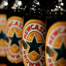 Heineken UK is recalling 550ml bottles of Newcastle Brown Ale after reports of glass fragments being found.
