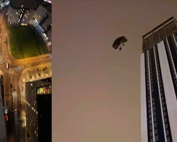 Base jumper parachutes off 500ft skyscraper.