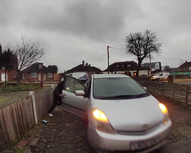 An UberEats driver forgot to put on his handbrake whilst delivering food and accidentally let his car roll into the customer's front porch. 