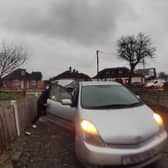 An UberEats driver forgot to put on his handbrake whilst delivering food and accidentally let his car roll into the customer's front porch. 