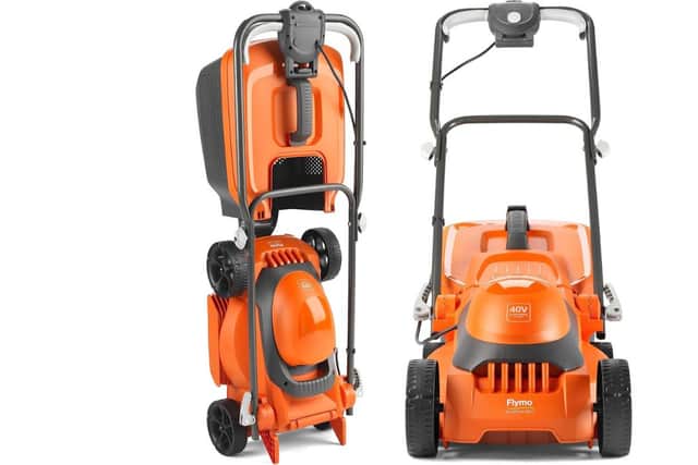 The mower folds away and stands up when it's not in use