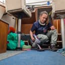 Gareth's wife Lizzy uses the Dyson Car+Boat to clean up the boat's cockpit