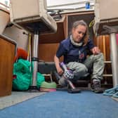 Gareth's wife Lizzy uses the Dyson Car+Boat to clean up the boat's cockpit