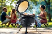 The Kamado-style ceramic BBQ in action – perfect for slow-smoked feasts and summer gatherings.