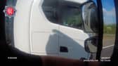 Lorry driver caught rolling cigarette with no hands on wheel