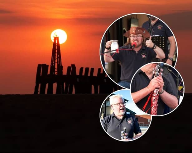A popular sea shanty crew lead a boozy sunset sing-along outside an RNLI station