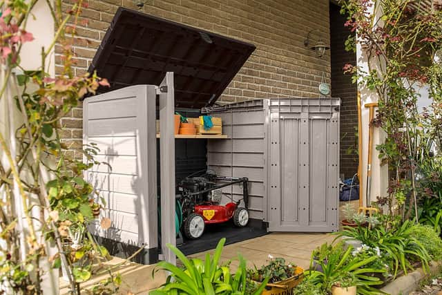 It's perfect for storing garden tools and other outdoor clutter