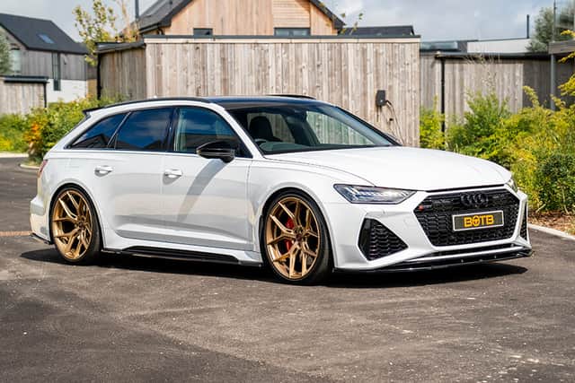 The gleaming white Audi was only part of the prize