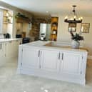 Mrs Hinch uses adjustable organisers to keep things like food neatly organised in her kitchen (pictured).