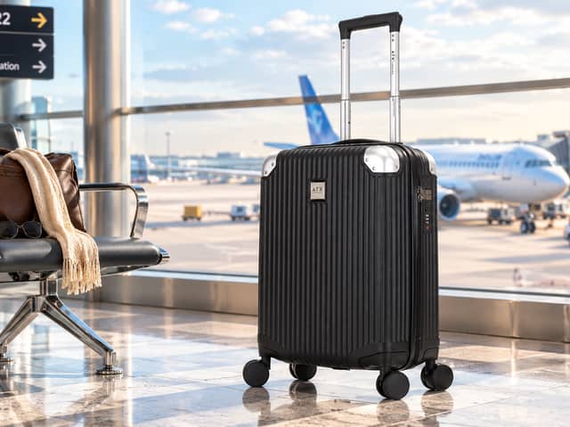 The ATX Luggage 21-inch hard-shell cabin suitcase has a 33-litre capacity, four dual spinner wheels and a built-in three-digit lock.