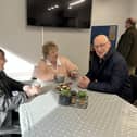 Mr Swinney heard from residents about the difficulties faced by the community following Storm Babet.