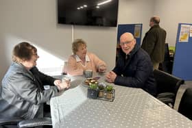 Mr Swinney heard from residents about the difficulties faced by the community following Storm Babet.