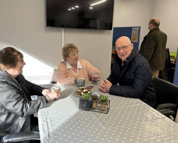 Mr Swinney heard from residents about the difficulties faced by the community following Storm Babet.