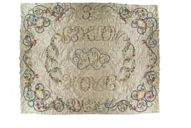 ​An elaborate bed cover worked by Lady Augusta Gordon.