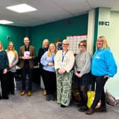 ​​Mr Gethins is pictured with staff during his visit to the centre.
