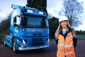 ​​Nicola Williams with NWH Group’s new electric artic lorry.